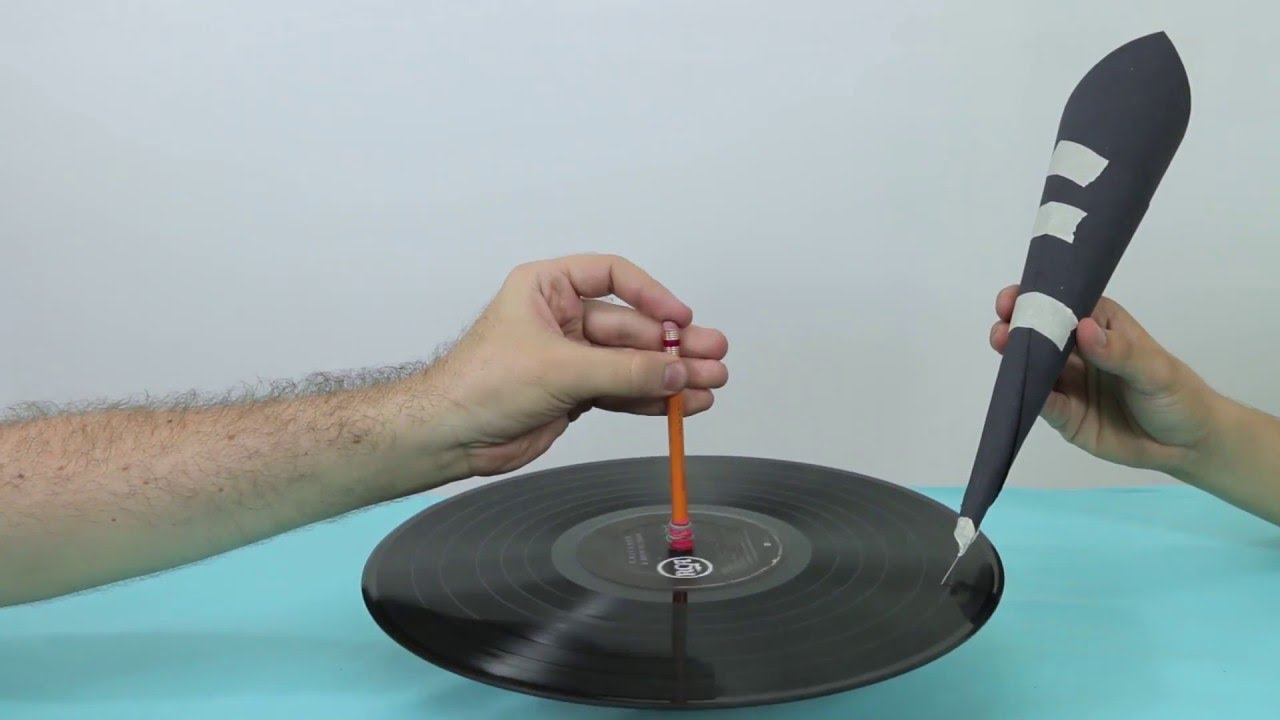 Este es el sonido de un disco de vinilo con una aguja y un cono de