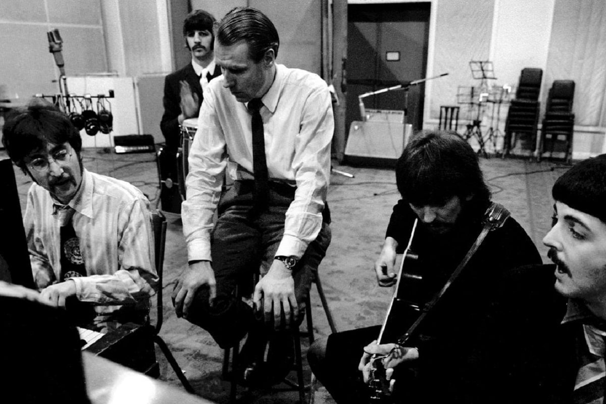 The Beatles y George Martin.
