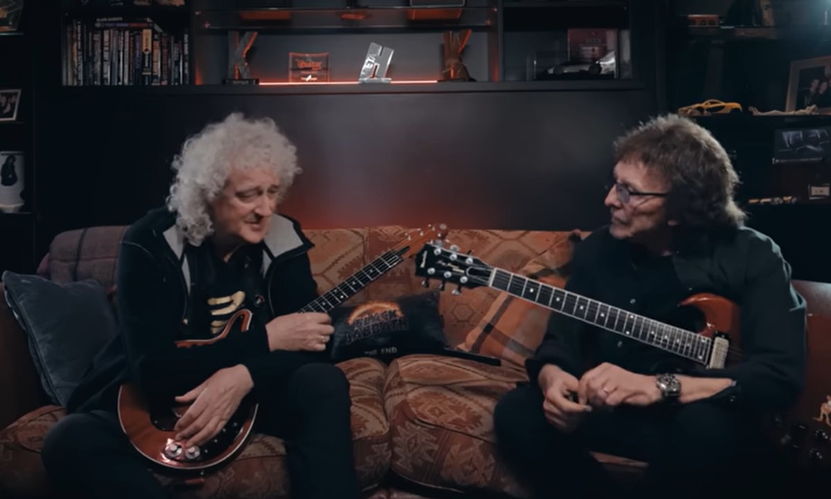 Brian May y Tony Iommi conversan con sus guitarras en mano